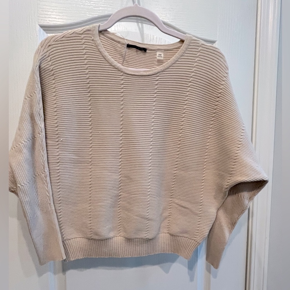 Very pale mauve lightweight sweater. Size med.